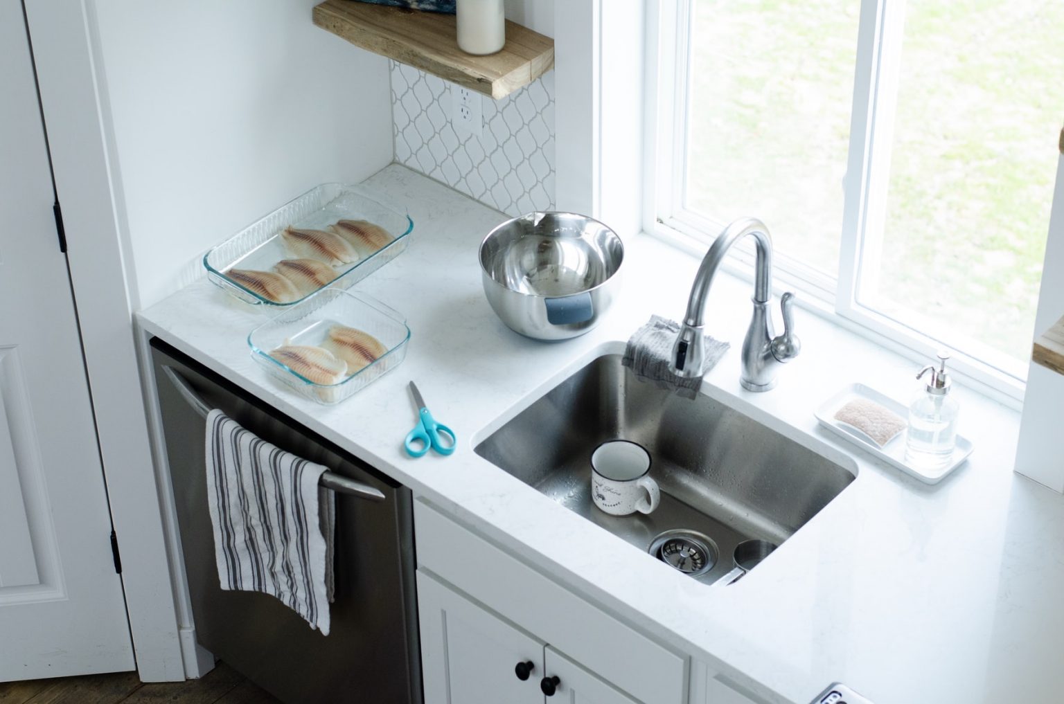 snaking kitchen sink with desposal
